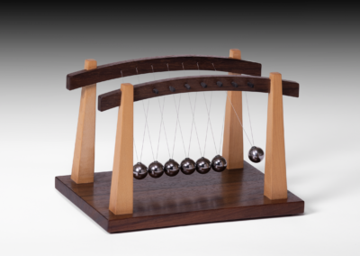 Newton's Cradle | Padouk & Maple